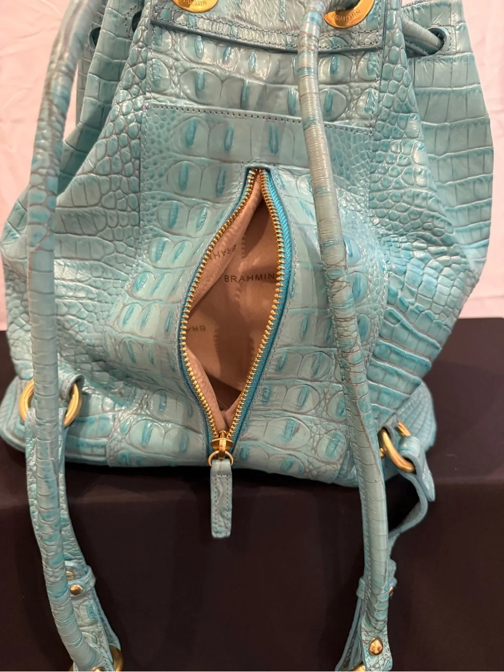 Brahmin Turquoise  very good condition sling backpack. Faux Alligator.